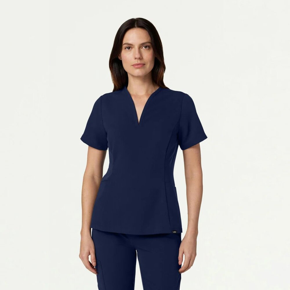 Jaanuu Women's Calix Fit and Flare Scrub Top in Midnight Navy